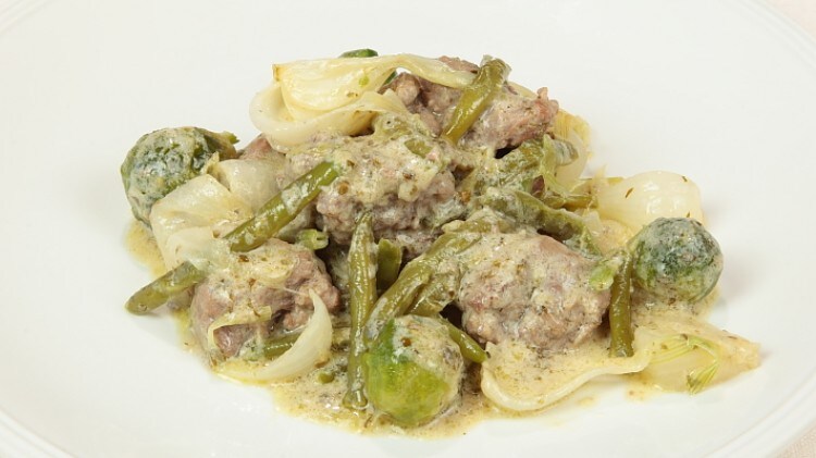 Stufato d'agnello con cipollotti