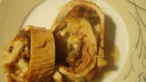 Arrotolato di tacchino ai funghi e prosciutto