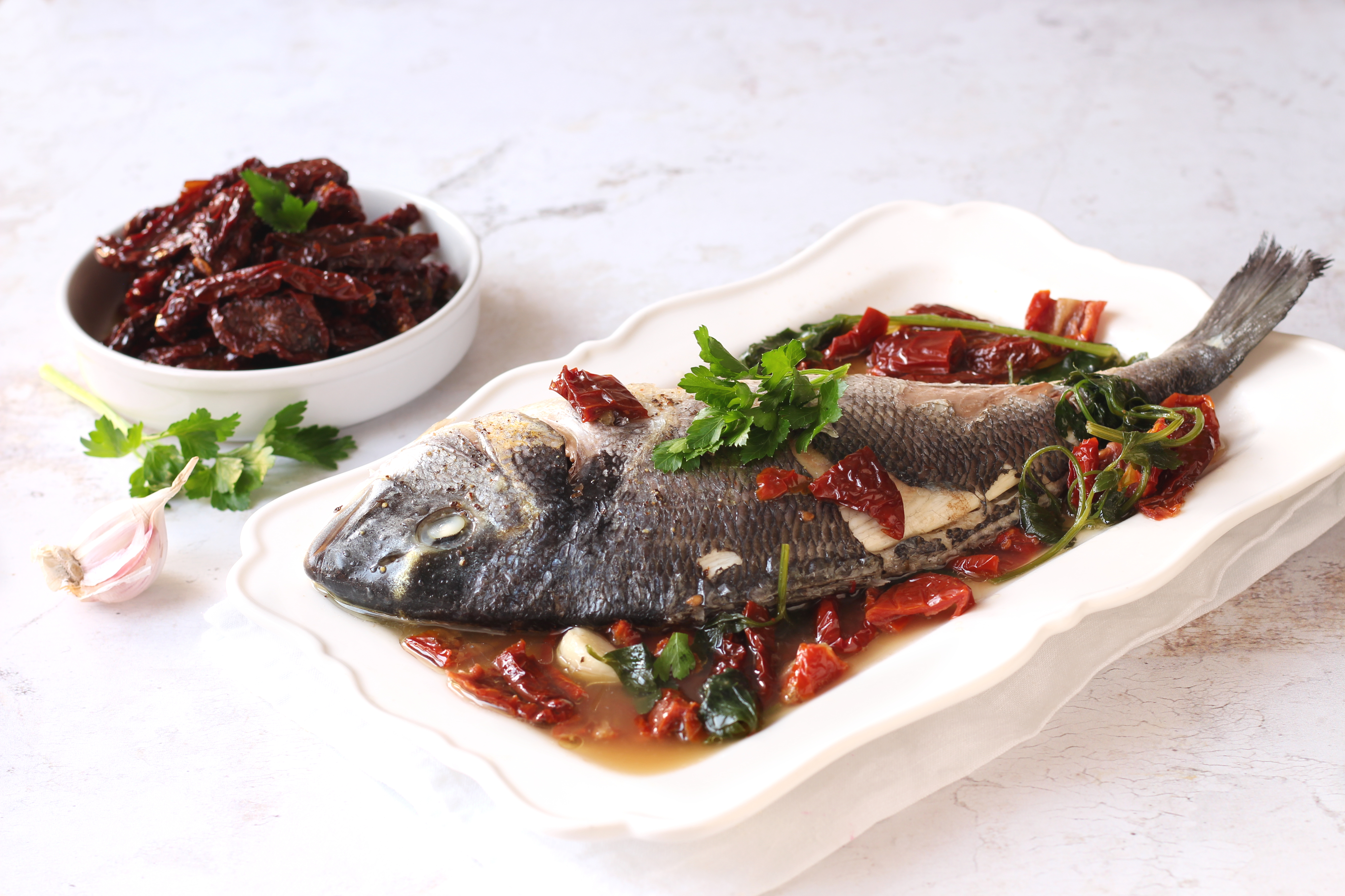 pesce all acqua pazza cannavacciuolo