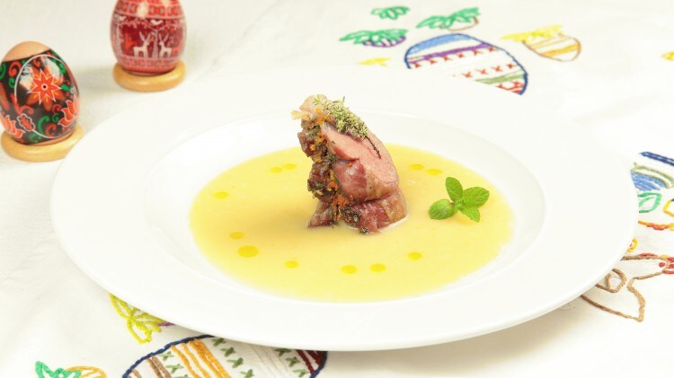 Carrè d'agnello all'arancia su zuppetta di patate