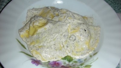 Ravioli di noci e ricotta al tartufo