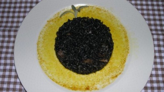 Risotto al nero di seppia con zafferano e curry