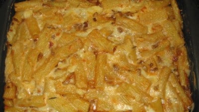 Teglia di pasta al forno con ragù e carciofi