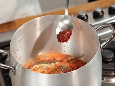 Cous cous con sugo di gamberi e aragostelle