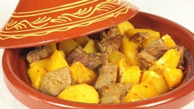 Tajine di montone con patate e arance